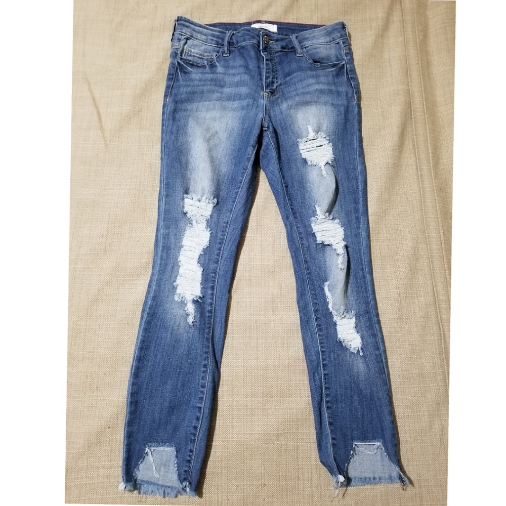 ..EUC Cielo Jeans with raw hem and cut outs